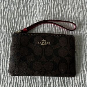Coach Signature Brown Wristlet with Red Accent